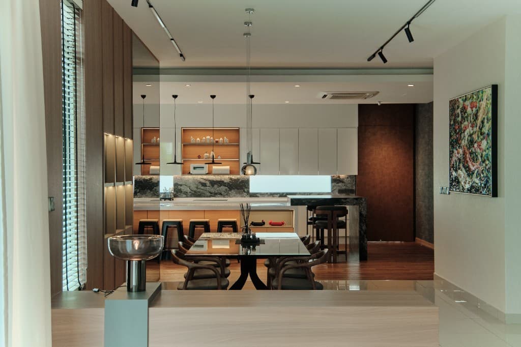 Open-plan dining and kitchen interior with timber detailing