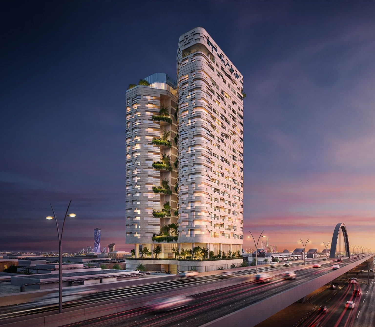 Residential tower with planted balconies at sunset