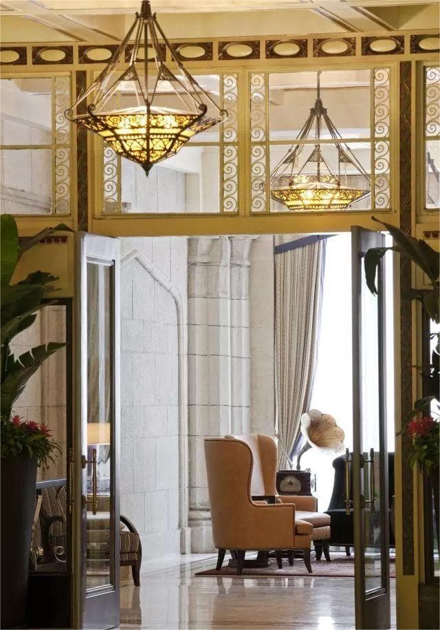 Heritage public area with grand columns and lounge seating