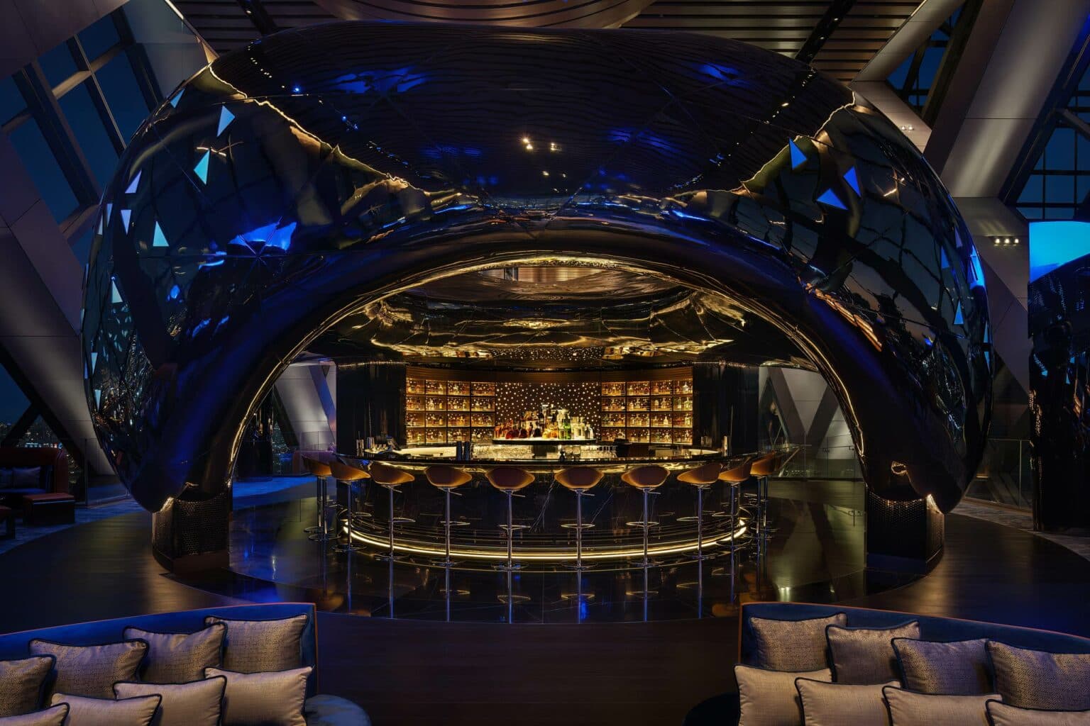 Curved bar front with sculptural ceiling